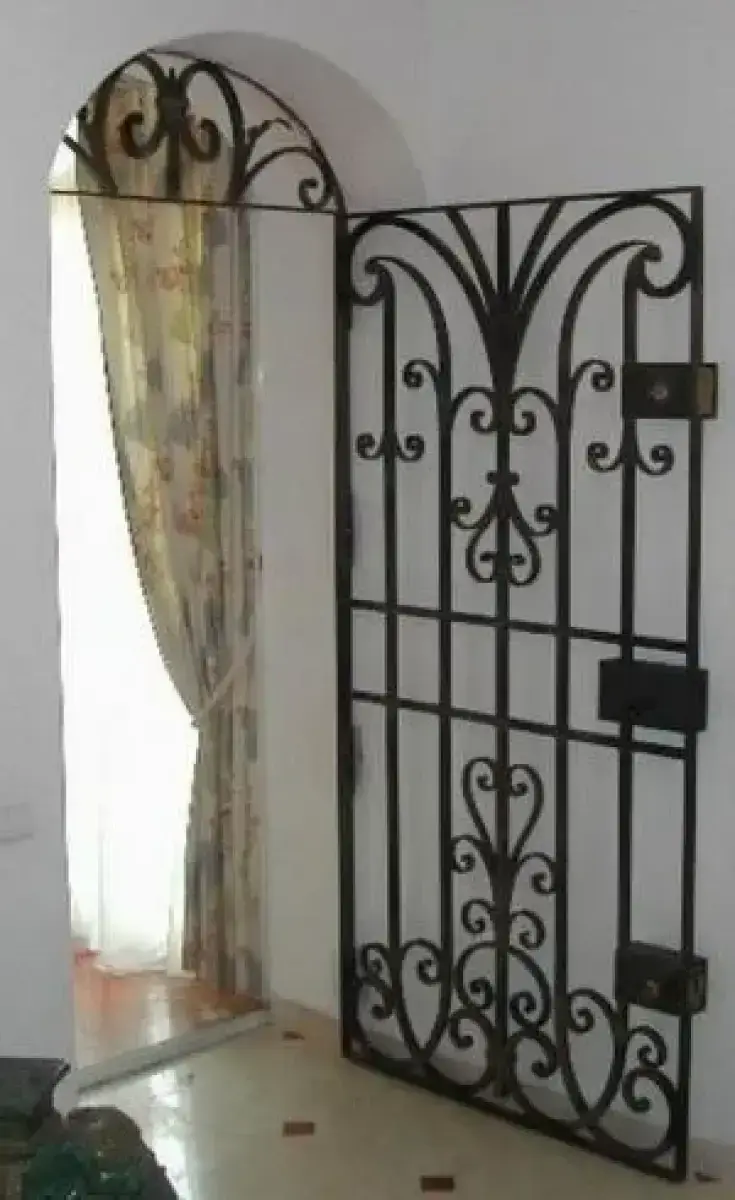 GRILLES EN FER FORGE INTERIEURES